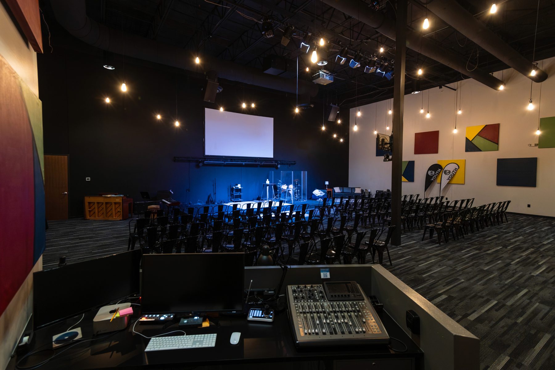 Lighting fixtures mounted in a performance space